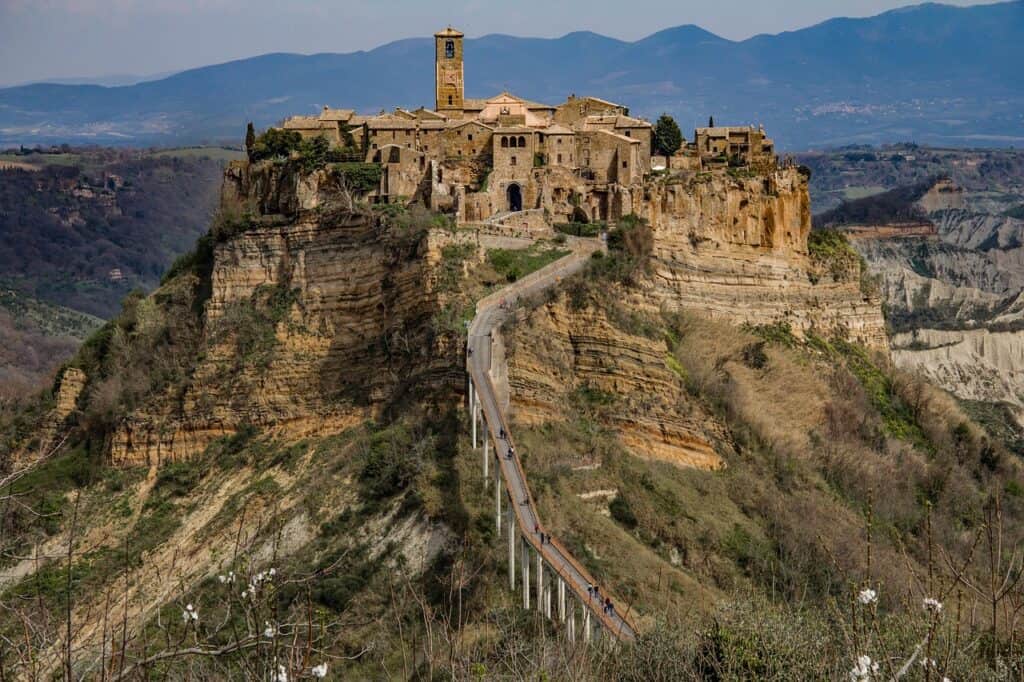 aerial view of Civita di Bagnoregio on its cliff surrounded by valleys