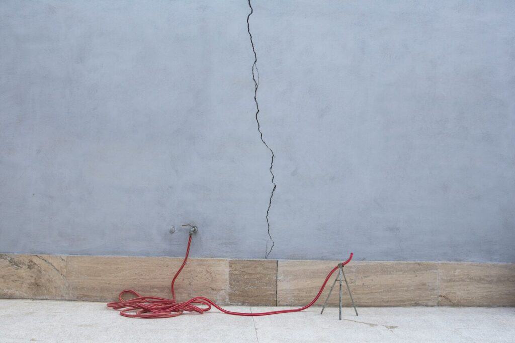 damaged electrical  cord in a hotel room