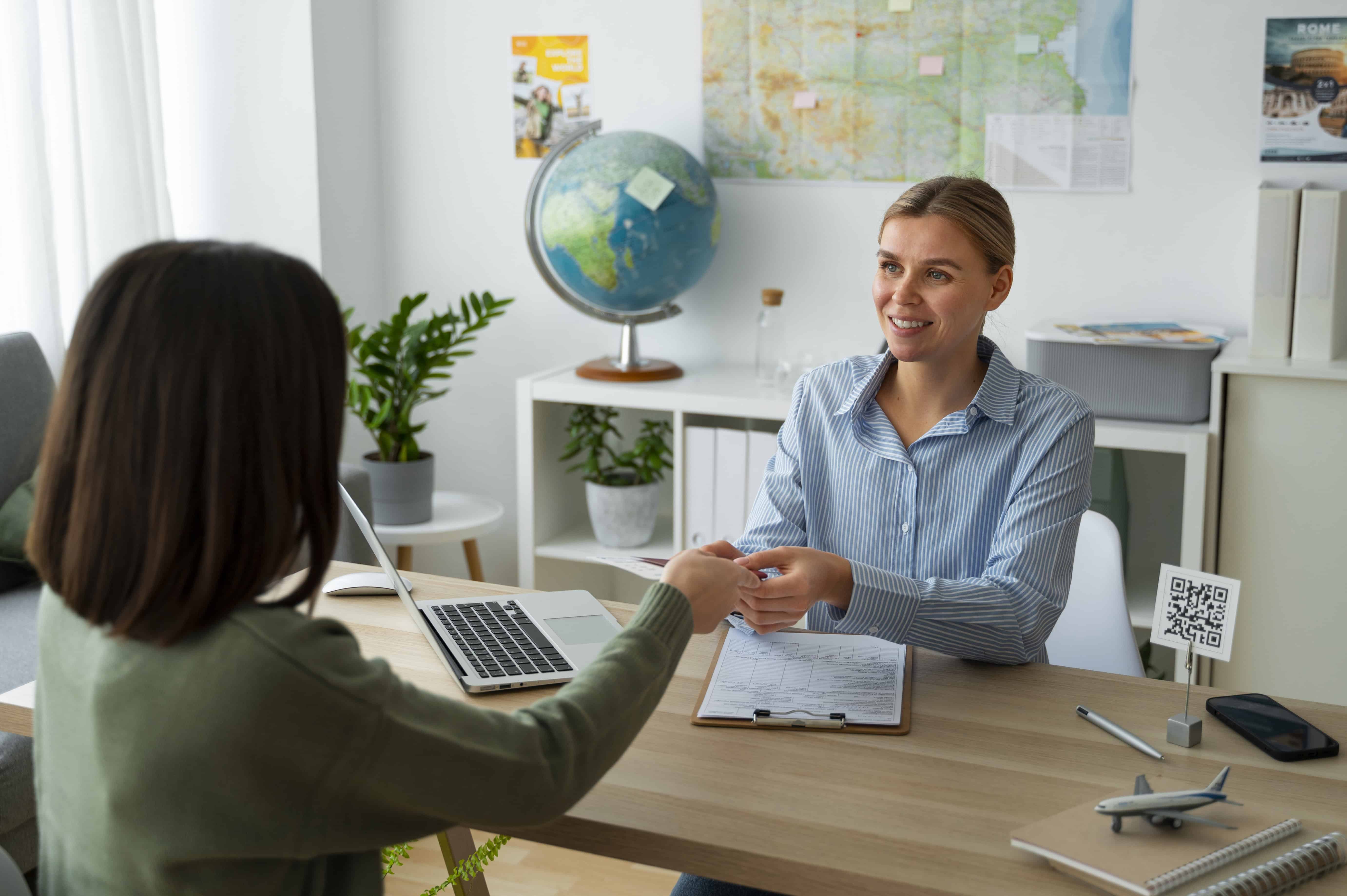 travel agent helping client at modern office