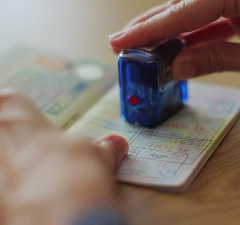 obtaining a stamp in the passport on entry into the territory of another state. Visa stamp in passport ID. Entry in foreign country.