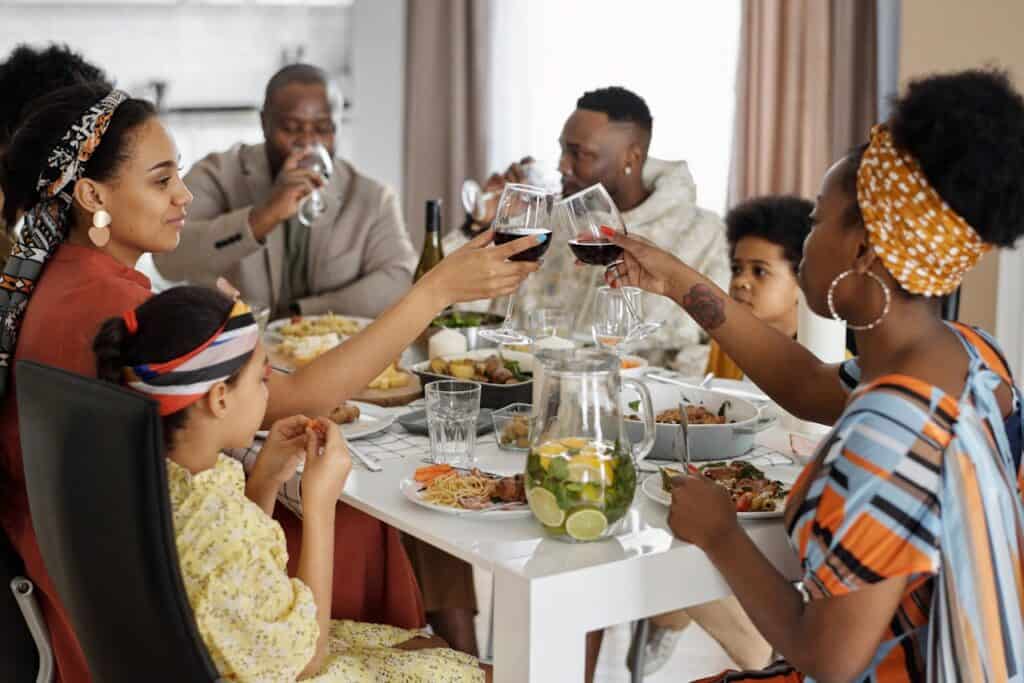 Friends gathered around a dinner table at home