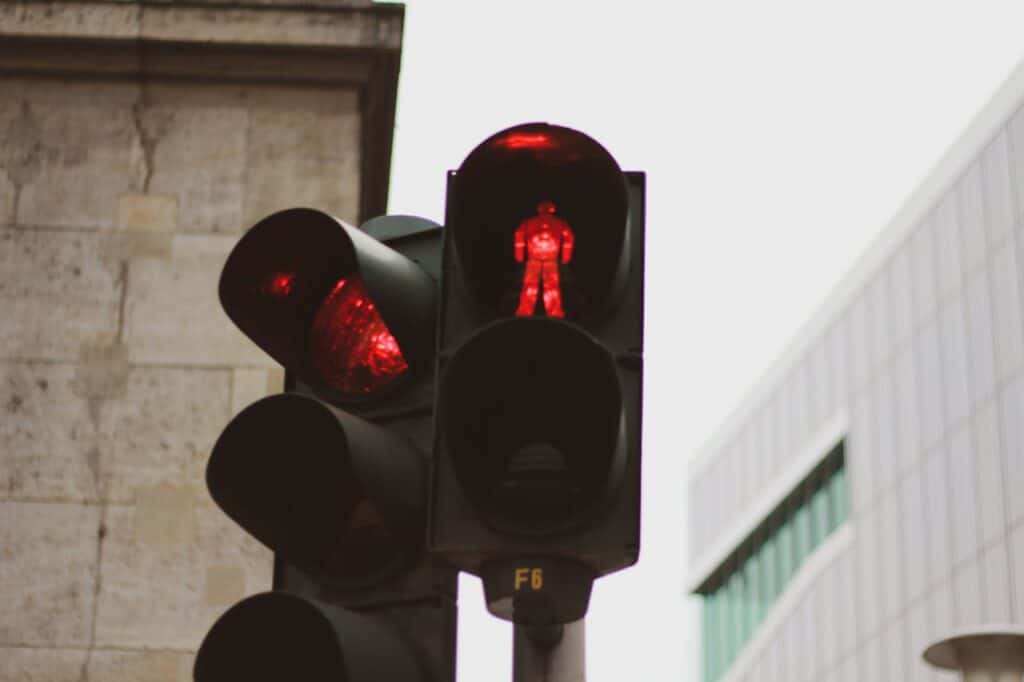 Red traffic light with “No Right Turn” sign
