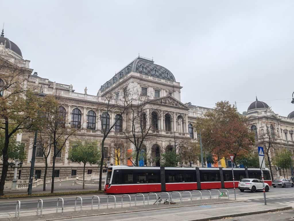 Vienna tram passing historic buildings like the Vienna State Opera or Ringstrasse