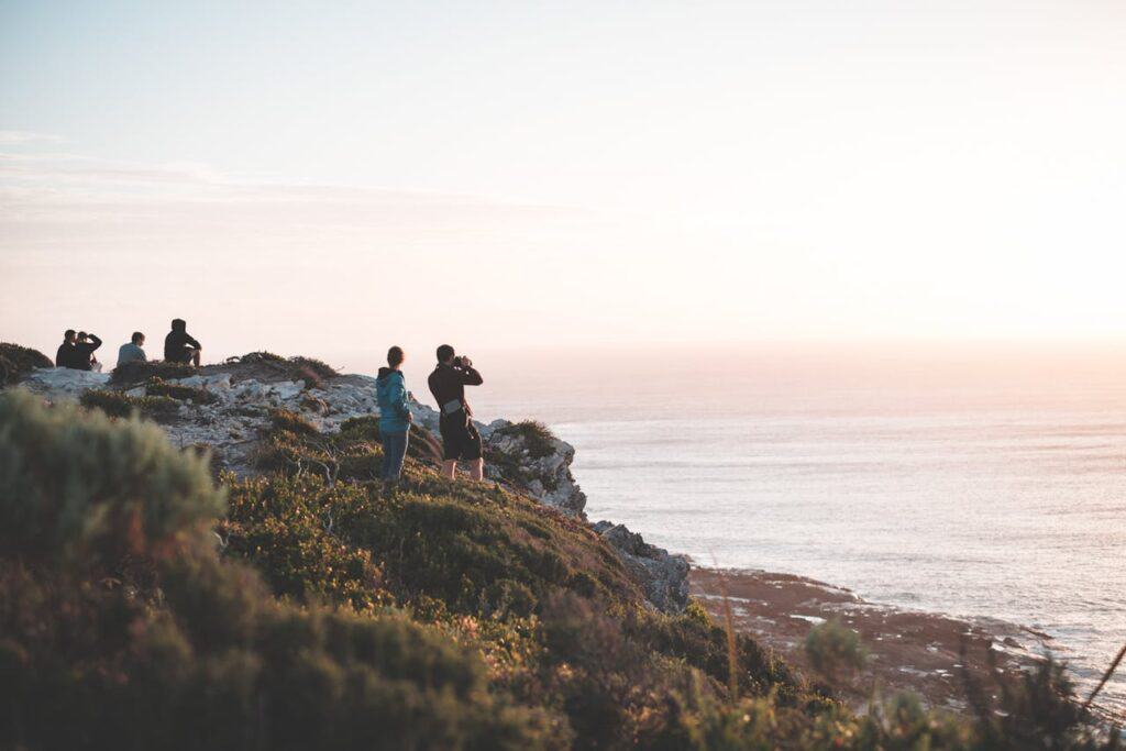 A scenic overlook with a small group pausing to enjoy the view.
