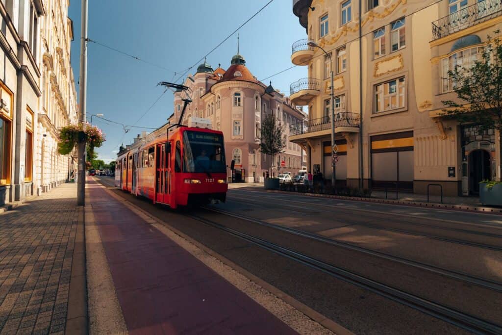 Vienna tram passing historic buildings like the Vienna State Opera or Ringstrasse