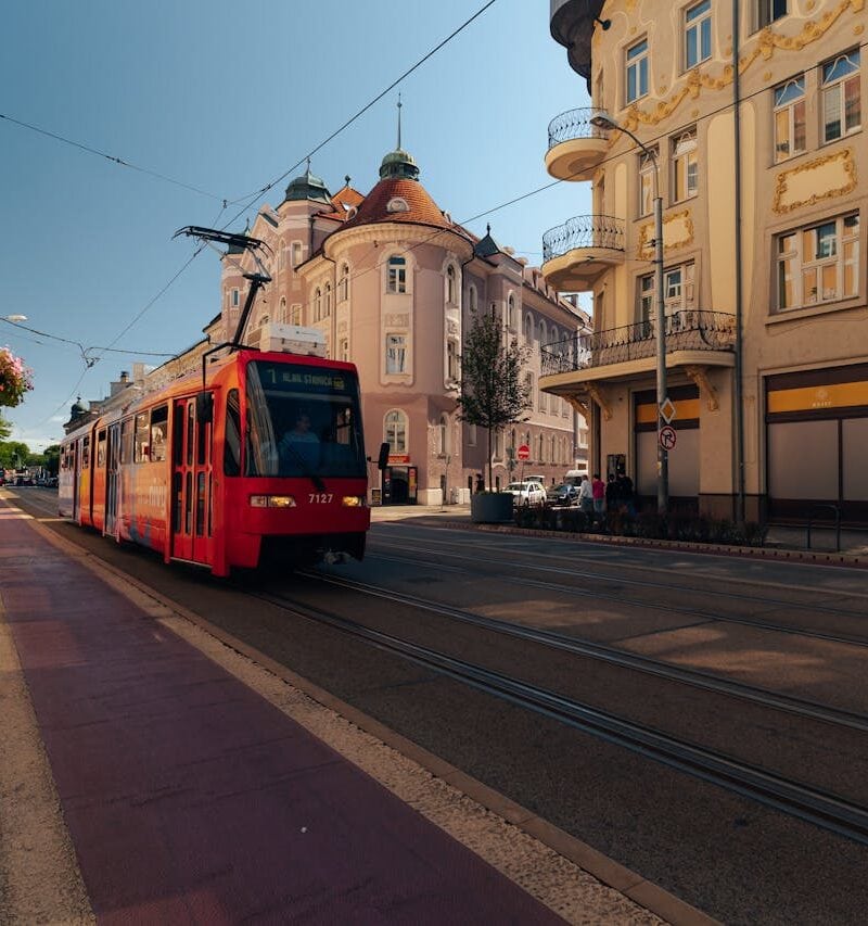 Vienna tram passing historic buildings like the Vienna State Opera or Ringstrasse
