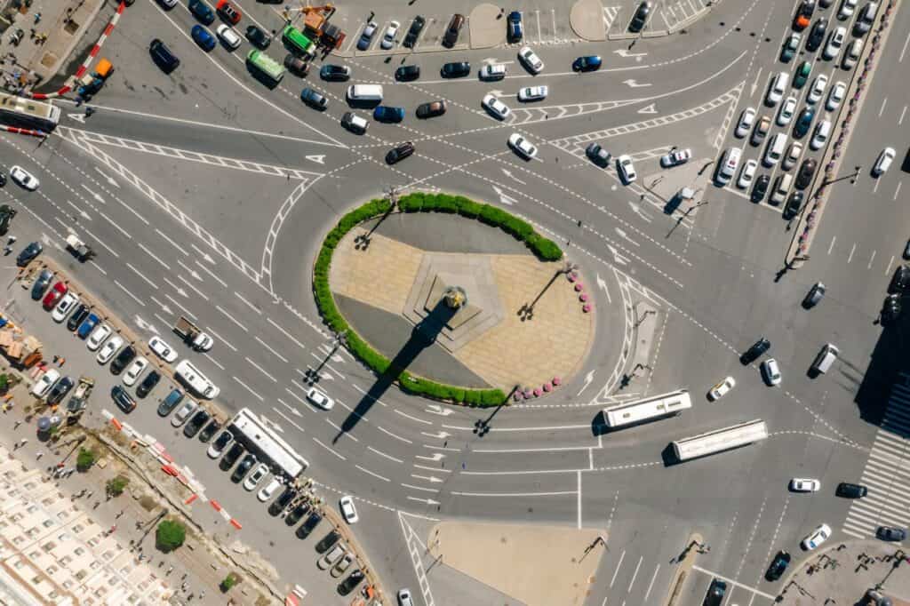 Cars merging smoothly in a busy circle