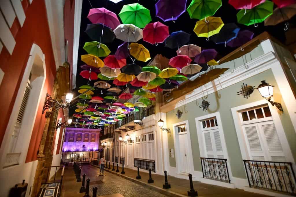 Old San Juan colorful streets with festive lights evening”