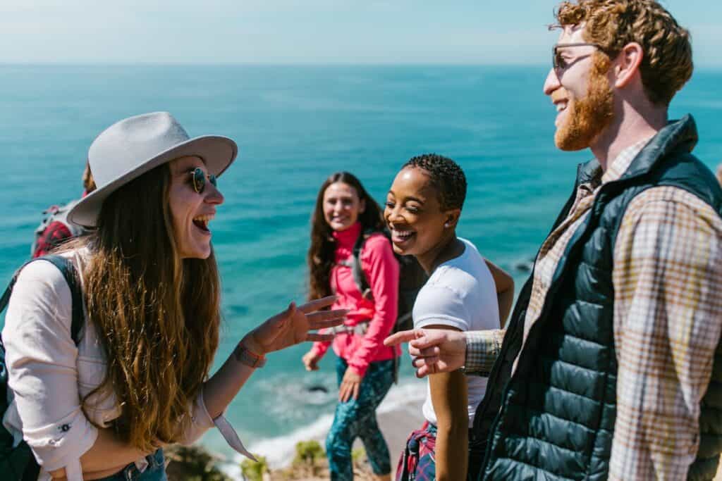 Diverse travellers exploring a mid-size city, reflecting different motivations and travel styles.