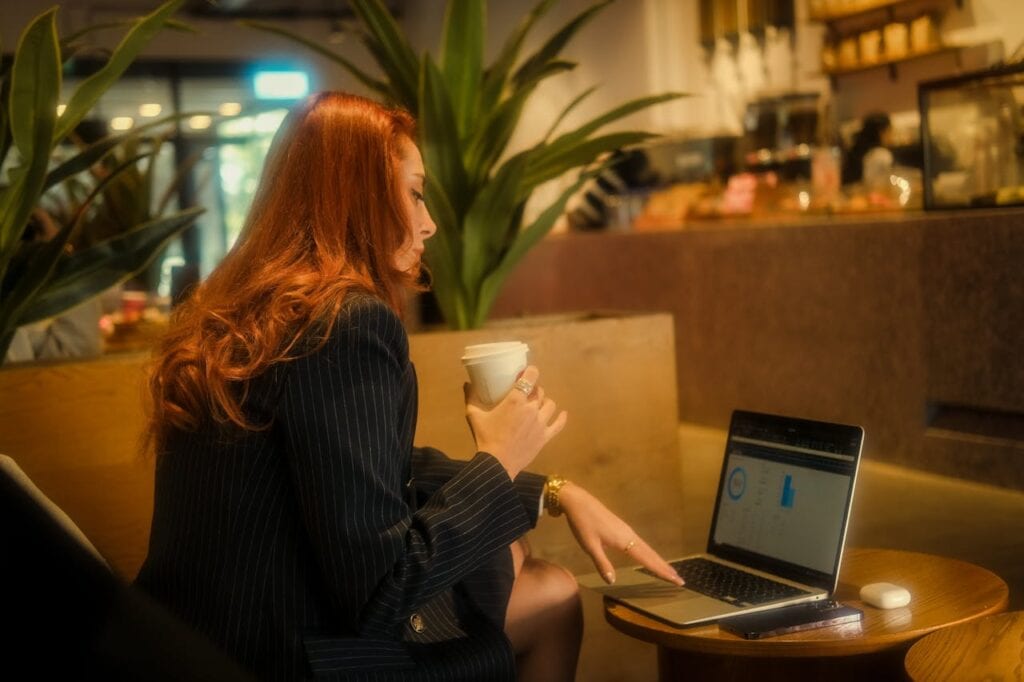 Redhead Working an Office Job In a Cafe