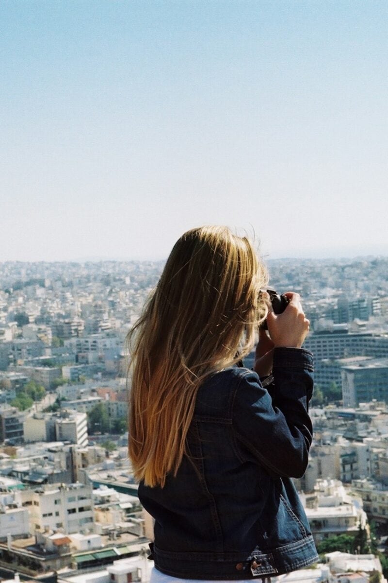 “solo traveler overlooking city