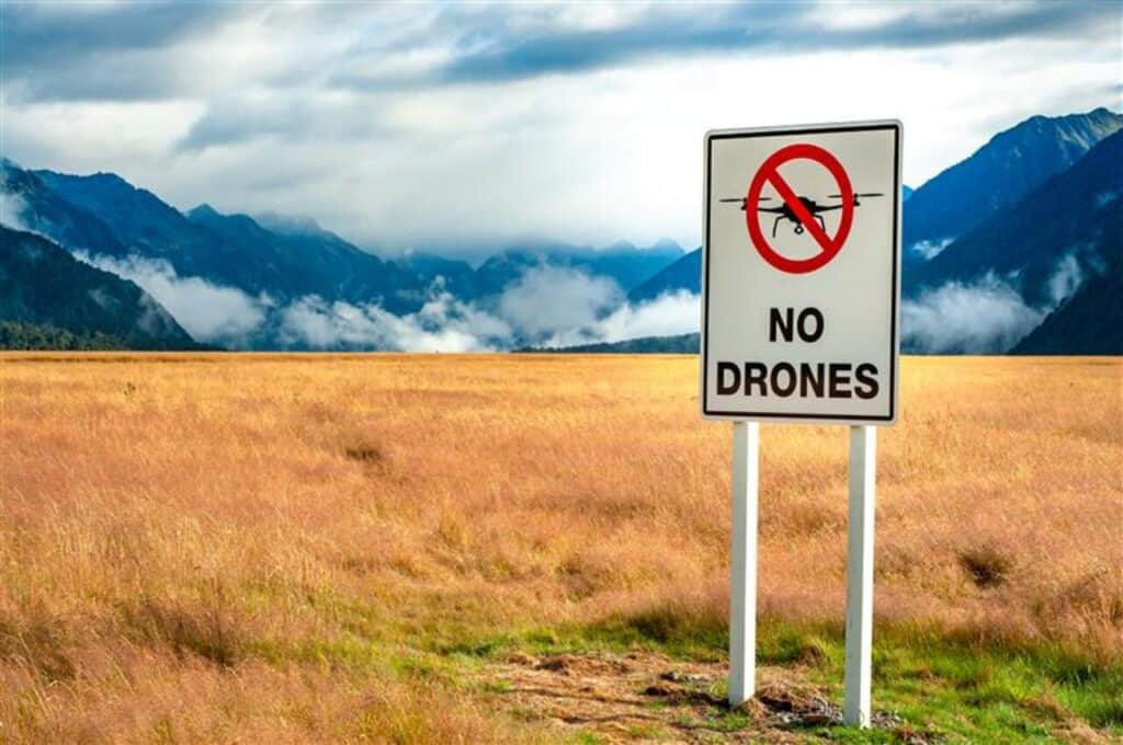 Use of drones in national park land, nature reserve is not permitted. Mountain landscape in the background