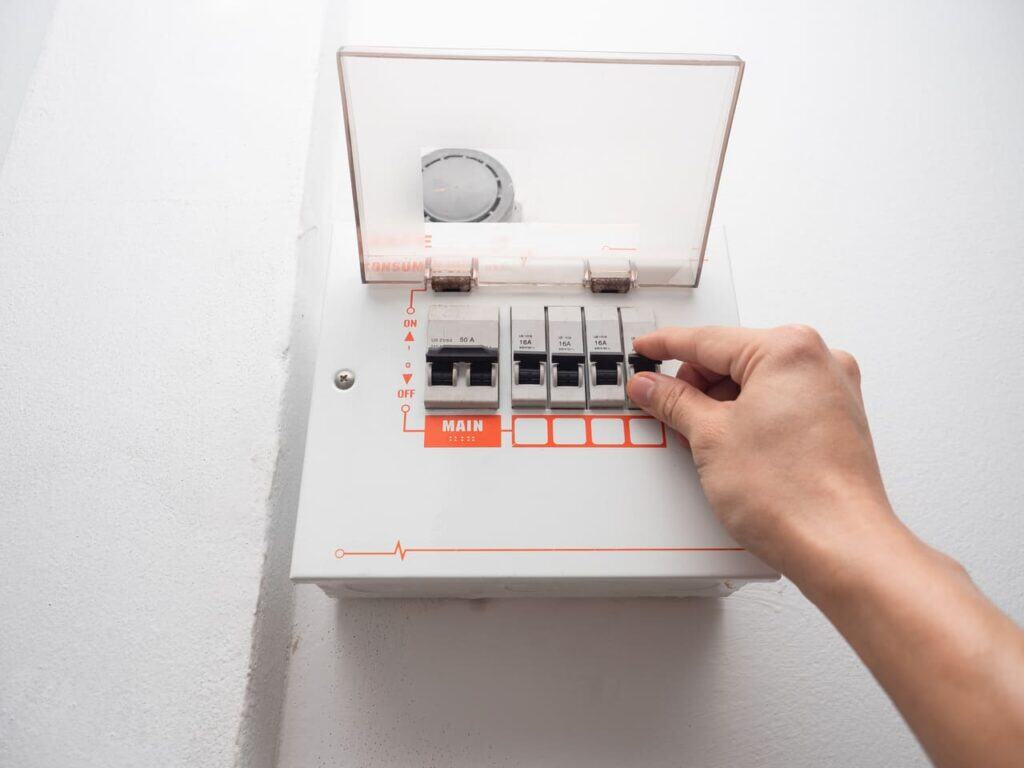 hand flipping breaker switch