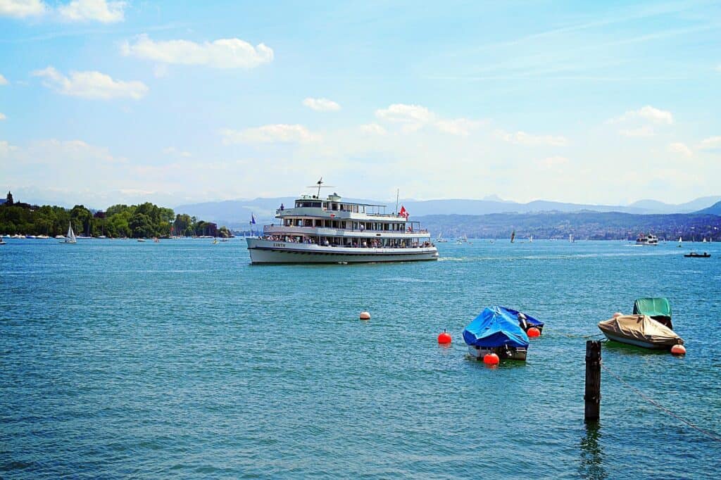 Boat gliding across Lake Zurich