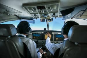 “pilot cockpit visit visitor airplane”
