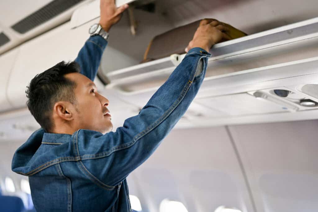 airplane overhead bin handrail