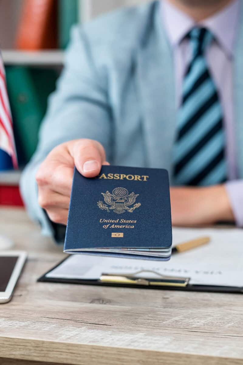 Immigration officer checking passport Schengen