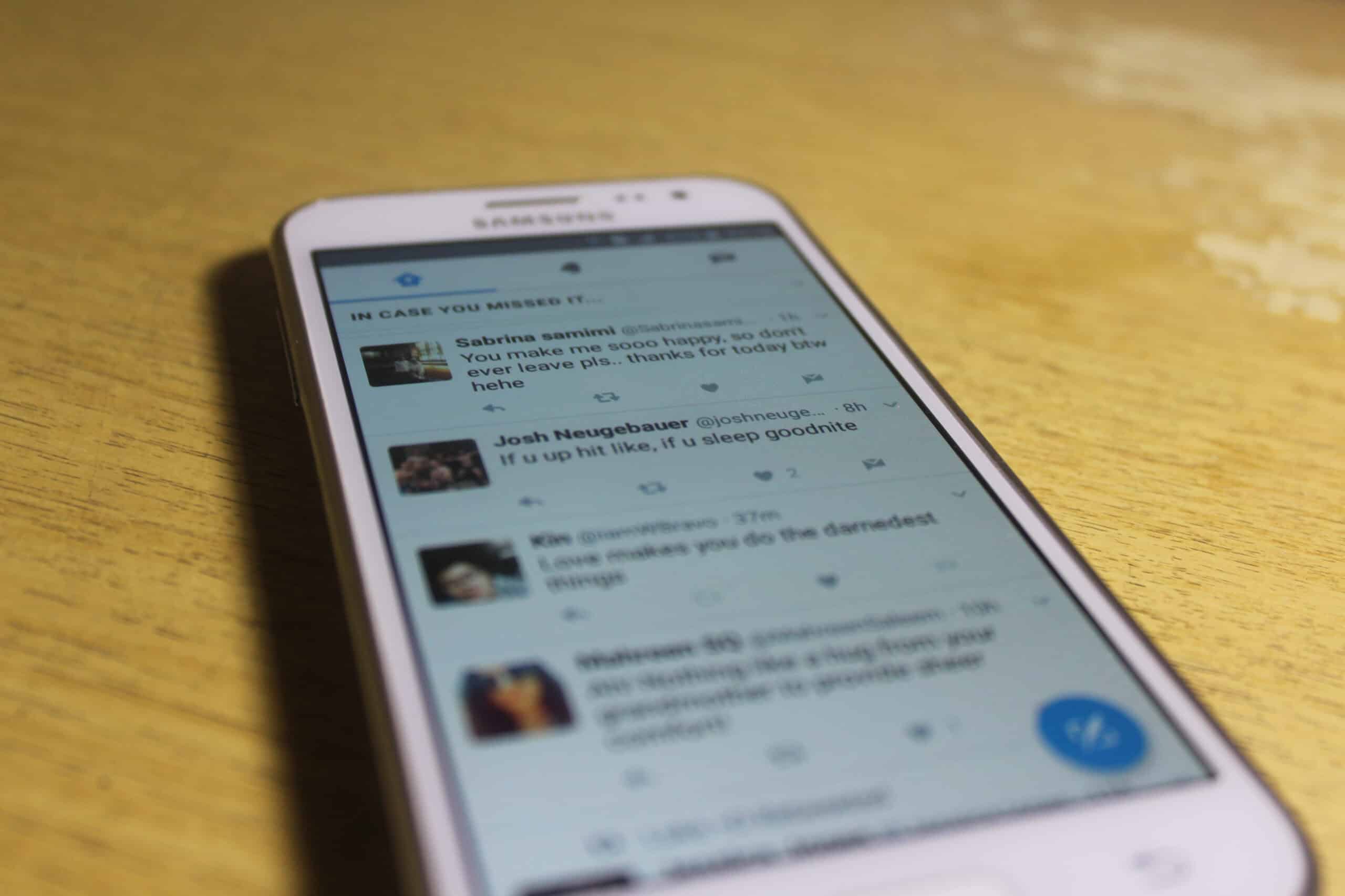 social media hate comments phone screen