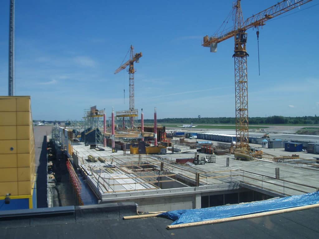 airport expansion construction cranes terminal