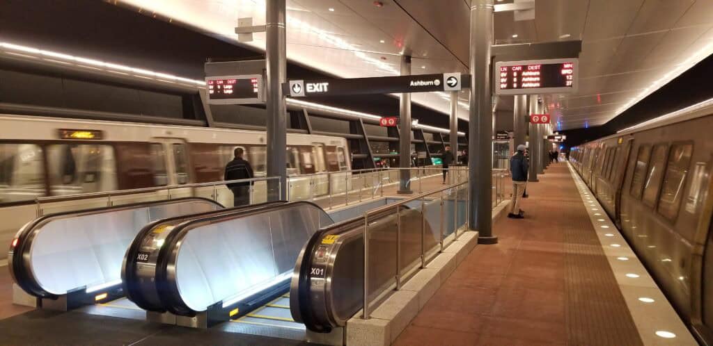 Dulles main terminal interior, IAD aero train station, IAD long concourse