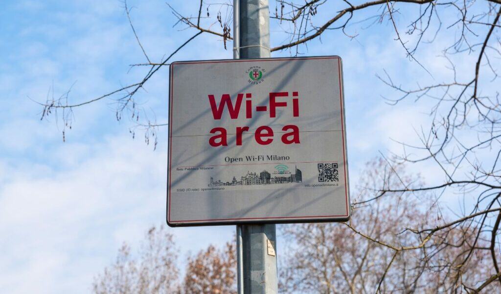 Free Wi-Fi sign. Wifi area sign at a Milan public park, Italy. Free wifi concept