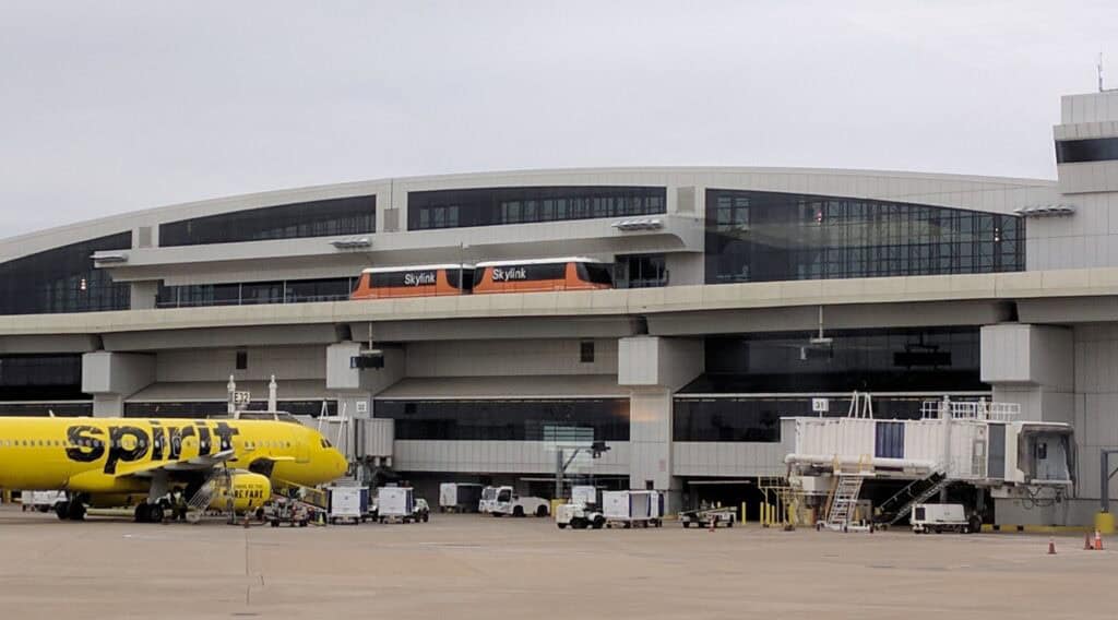 DFW airport concourse, DFW long corridor, DFW skylink train
