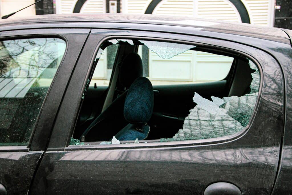 broken car window after theft inside vehicle