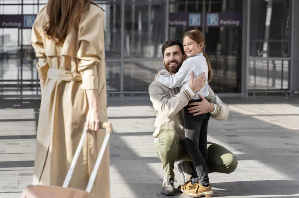 airport jet bridge gate family hug