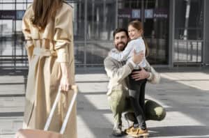 airport jet bridge gate family hug