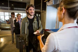 flight attendants greeting passengers calm professionalism
