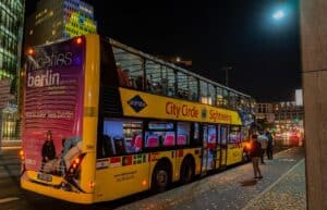tour bus parked arena loading dock night