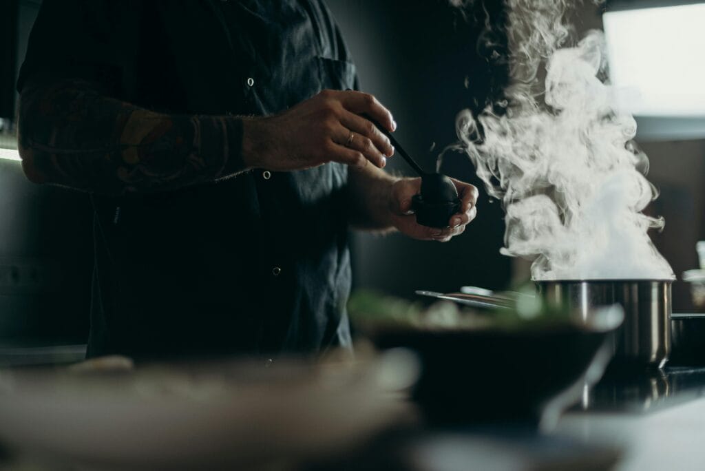 1950s kitchen cook smoking while cooking