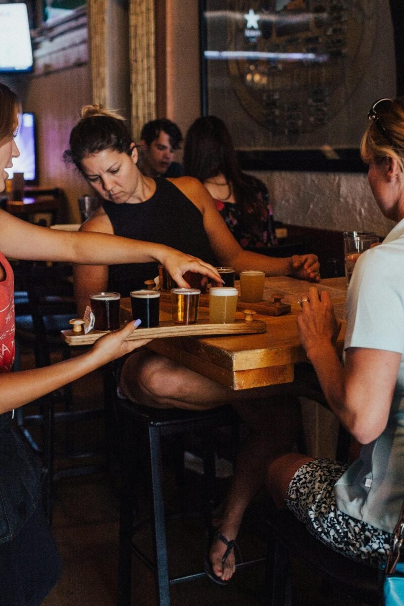 beer flight on wooden table