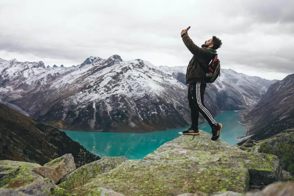 solo traveler overlooking landscape decision moment