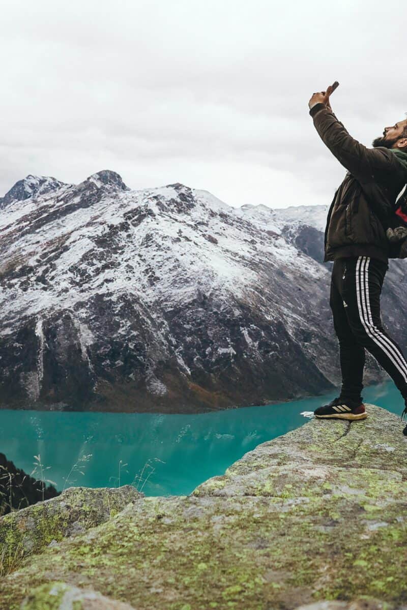 solo traveler overlooking landscape decision moment