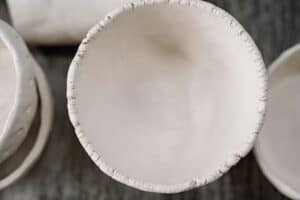 inspecting ceramic bowl for cracks