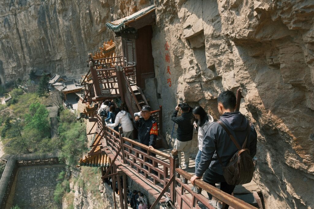 narrow ancient steps crowded mountain tourists
