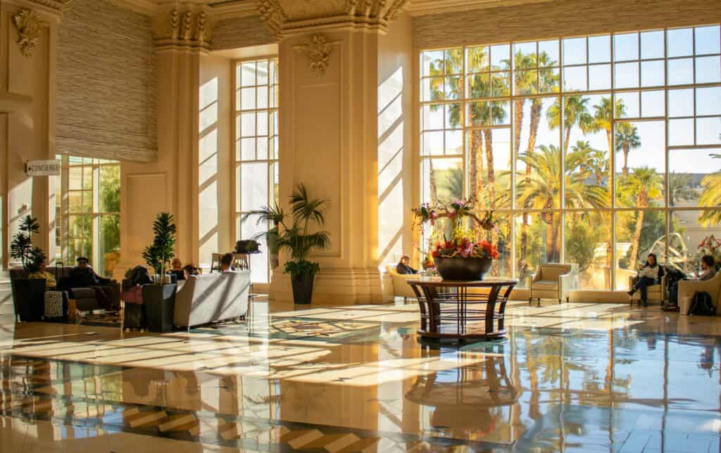 “hotel lobby afternoon sunlight travelers