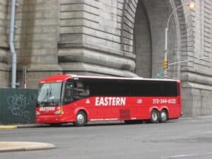 1024px-Coach_USA_Eastern_Shuttle_bus-red