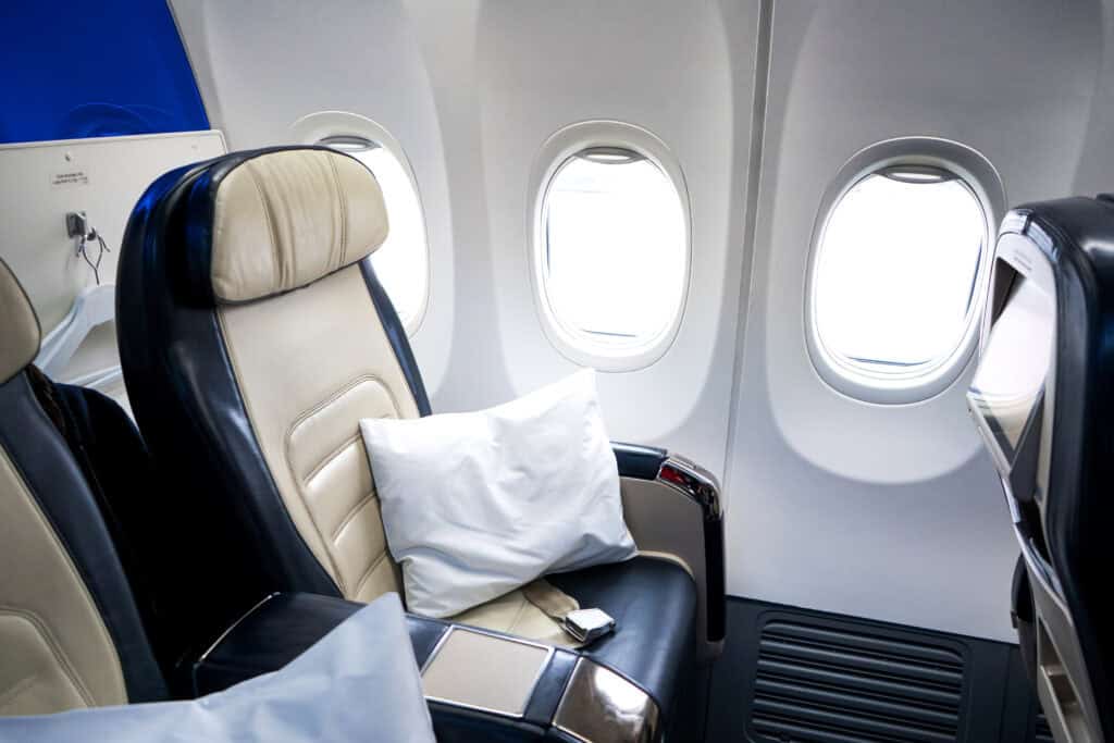 thin airline blanket and pillow economy seat
