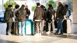 ravelers with backpacks airport terminal departure