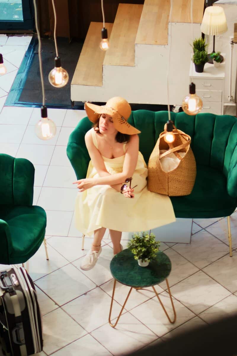 Bellhop offering services to woman