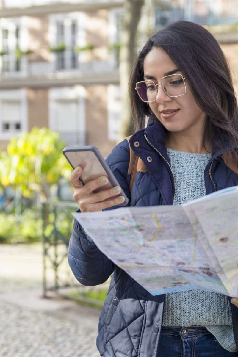 traveler looking at map city