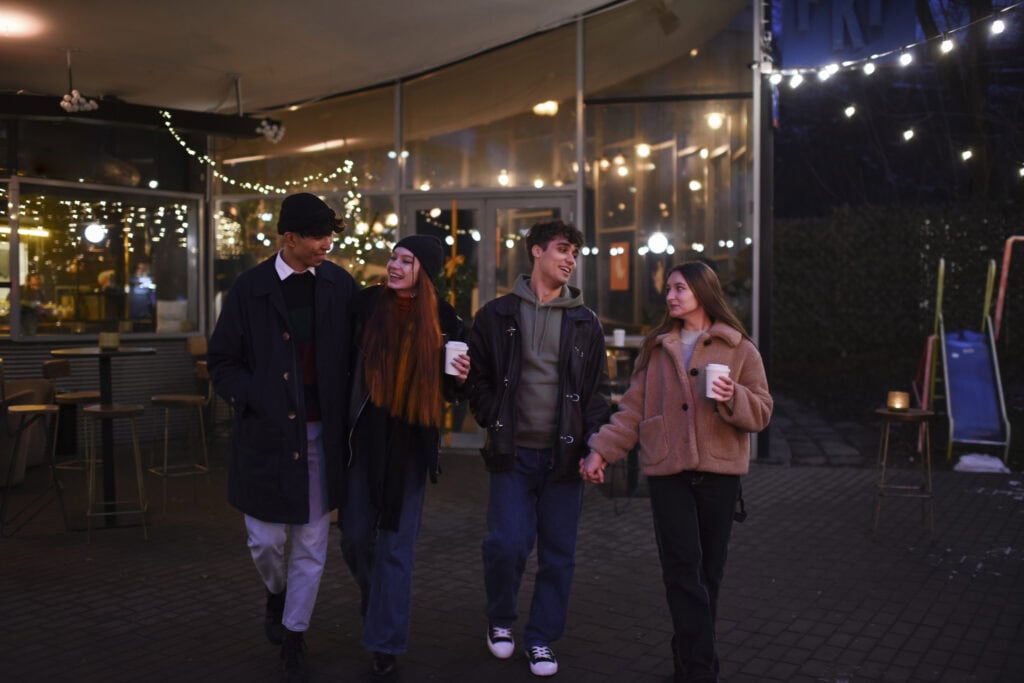 friends regrouping at night winter