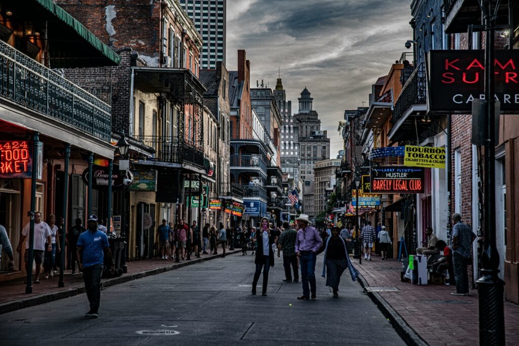 crowded tourist city street daytime New Orleans, LA, USA