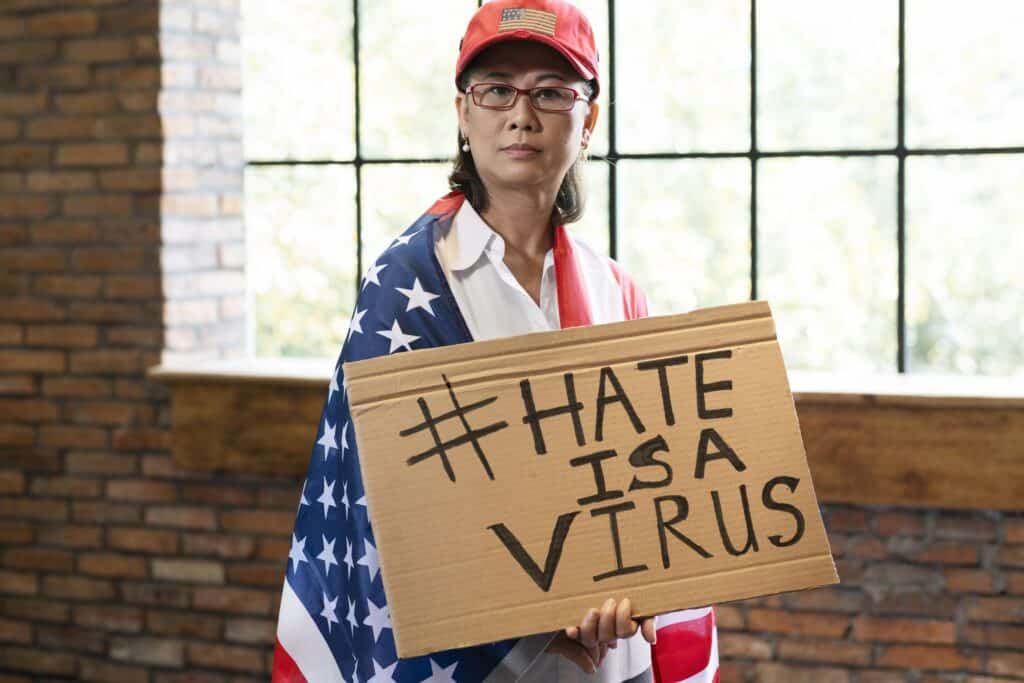 medium-shot-woman-with-american-flag-placard