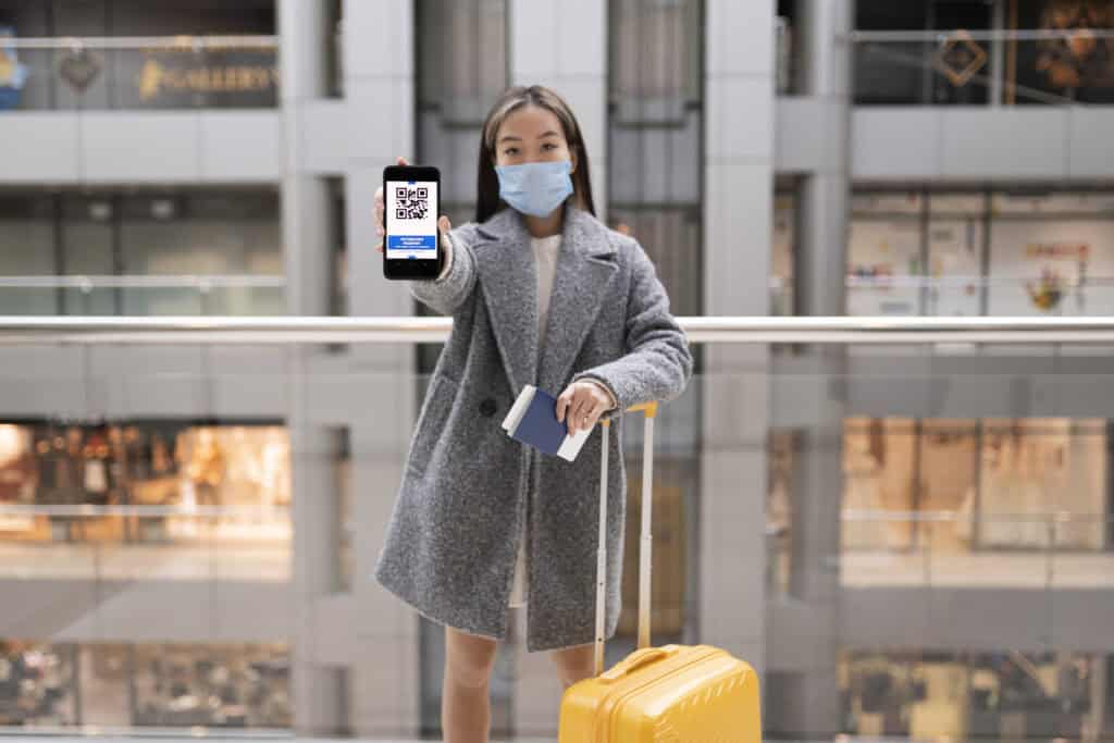 passport and smartphone airport