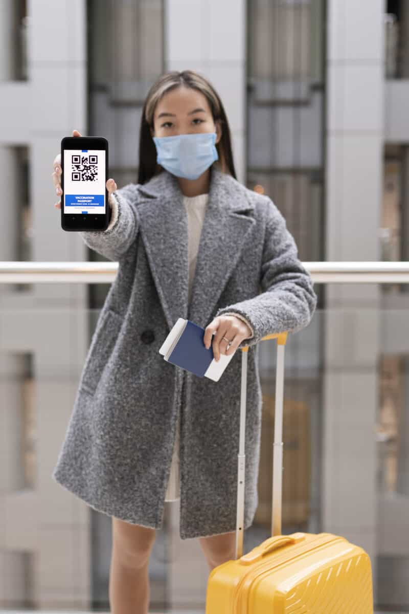 passport and smartphone airport