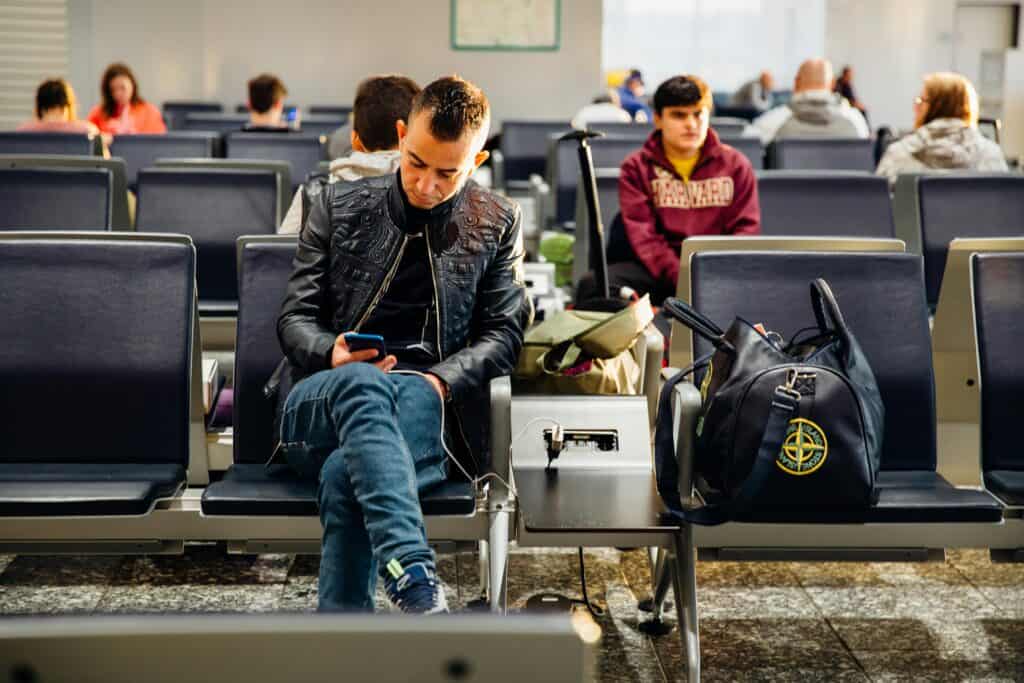 airport charging station travelers