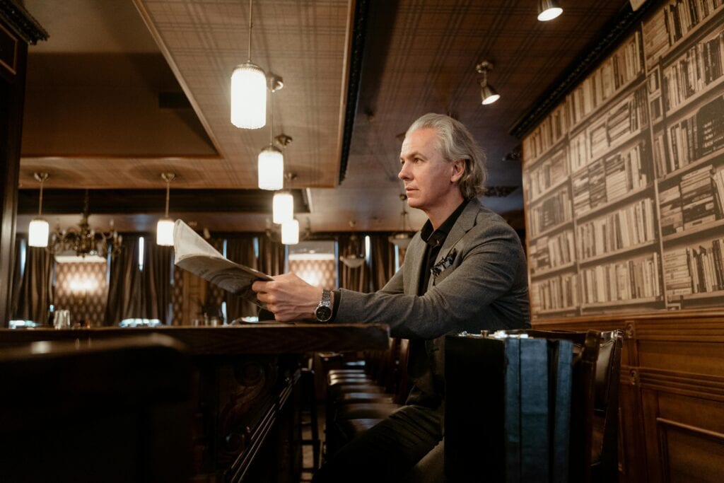 wood-paneled bar interior low ceiling